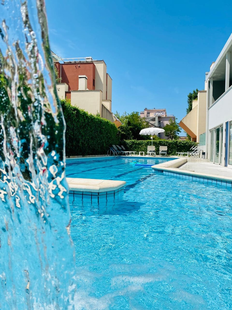 Swimming pool, sunbed