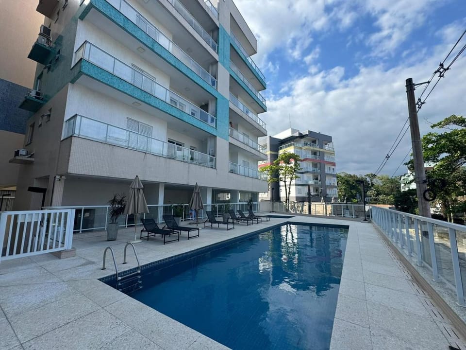 QUARTO ANDAR VISTA PARA O MAR COM piscina CLIMATIZADA Apartment in Ubatuba