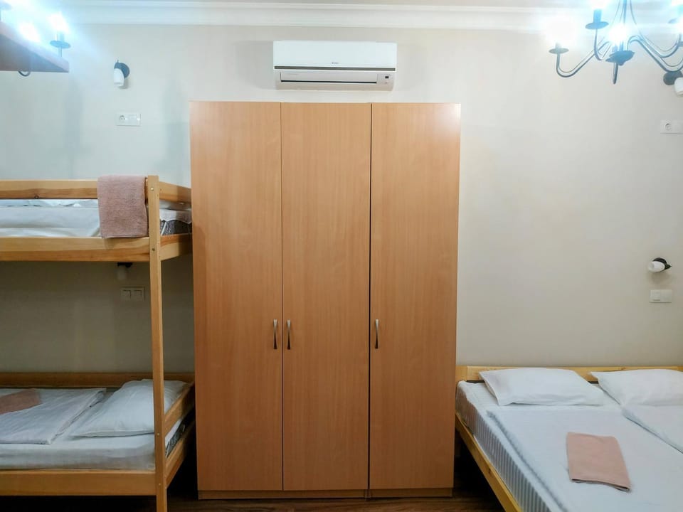 Bed, Photo of the whole room, towels, wardrobe, air conditioner
