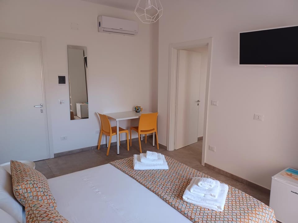 Bed, Photo of the whole room, Bedroom, towels, air conditioner