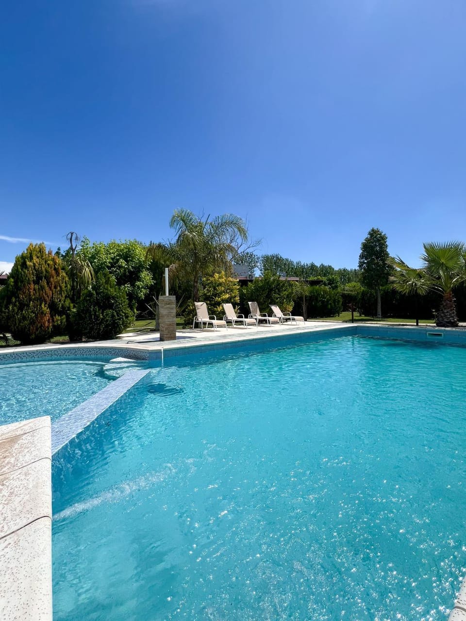 Swimming pool, sunbed