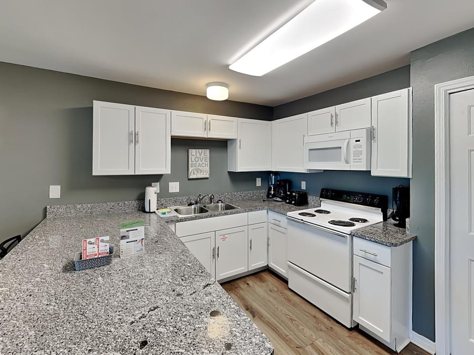 Kitchen or kitchenette, microwave, oven, stove, kitchen