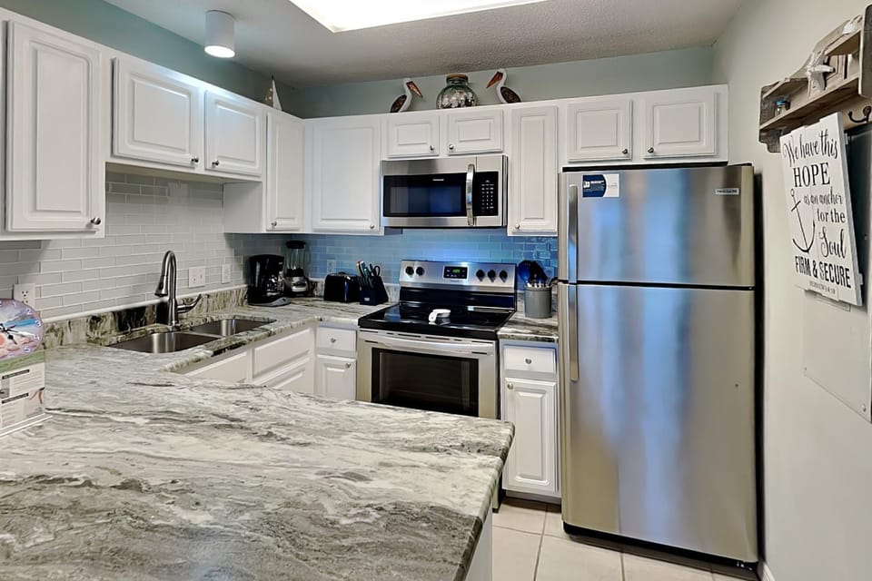 Kitchen or kitchenette, furniture, microwave, oven, stove, kitchen