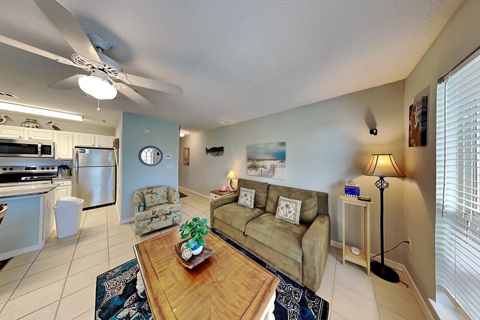 Kitchen or kitchenette, Living room, Seating area, furniture, microwave