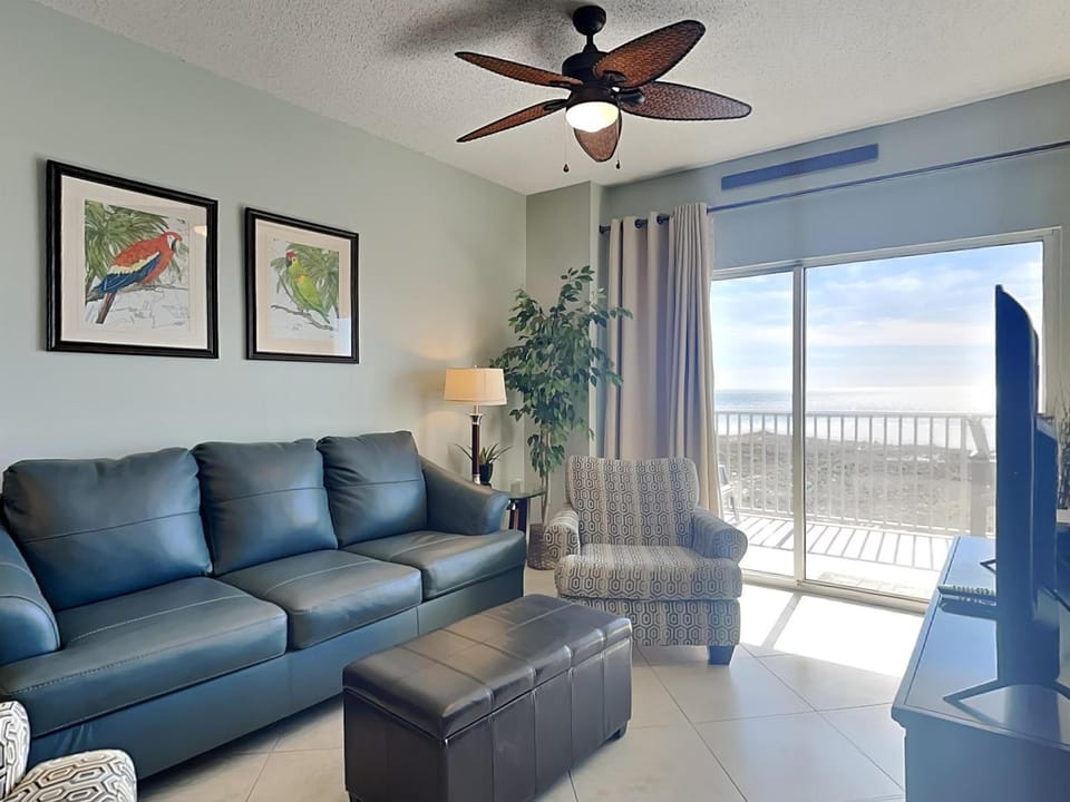 View (from property/room), Balcony/Terrace, Living room, Seating area, Beach, furniture