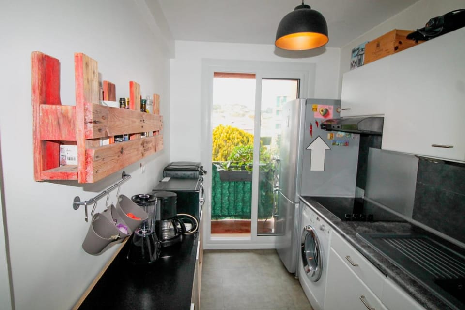 Kitchen or kitchenette, dishwasher, oven, stove, toaster