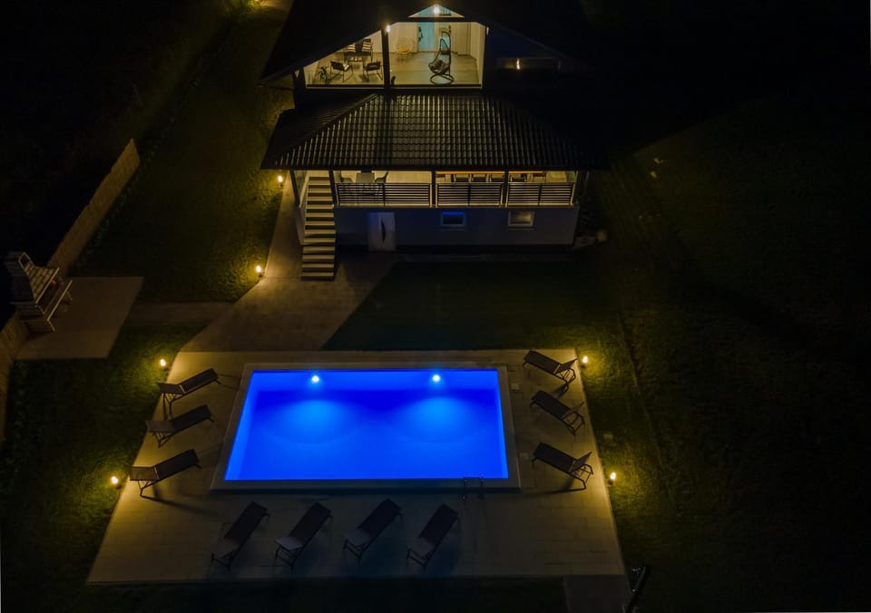 Night, Pool view, Swimming pool, sunbed