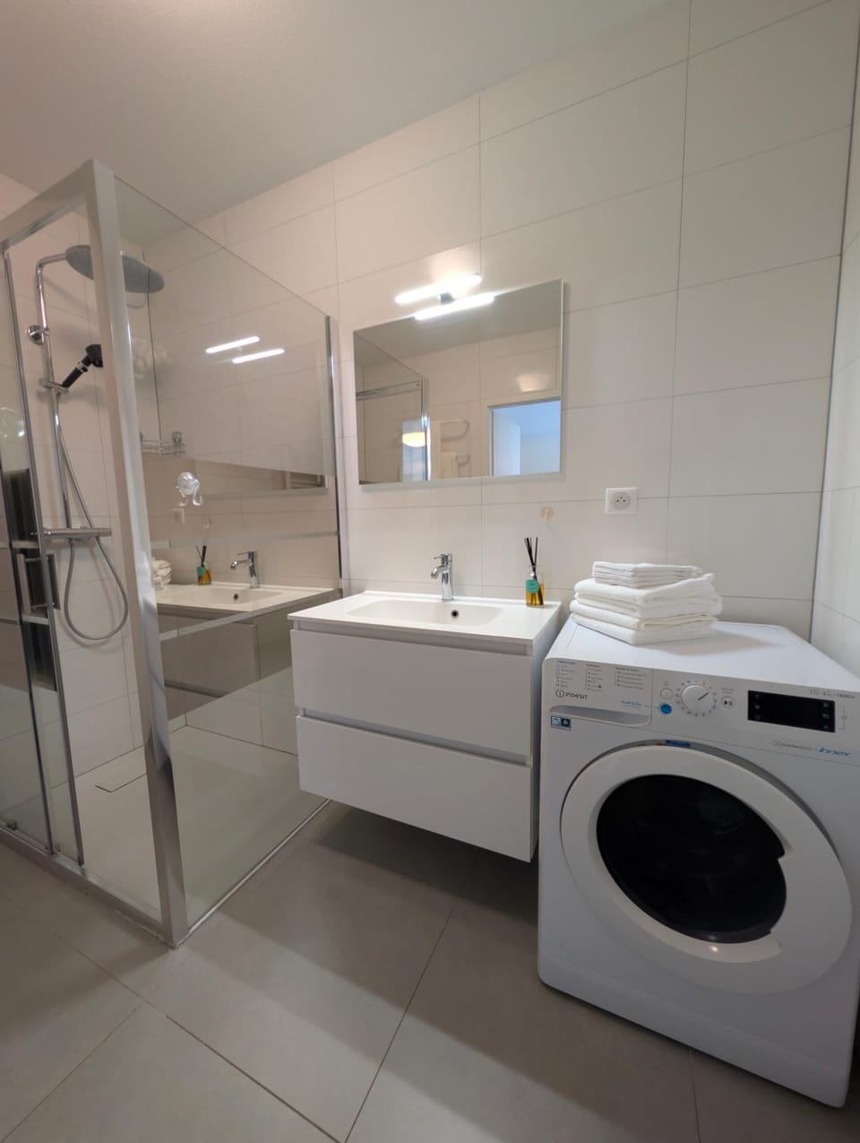 Bathroom, towels, washing machine, dryer