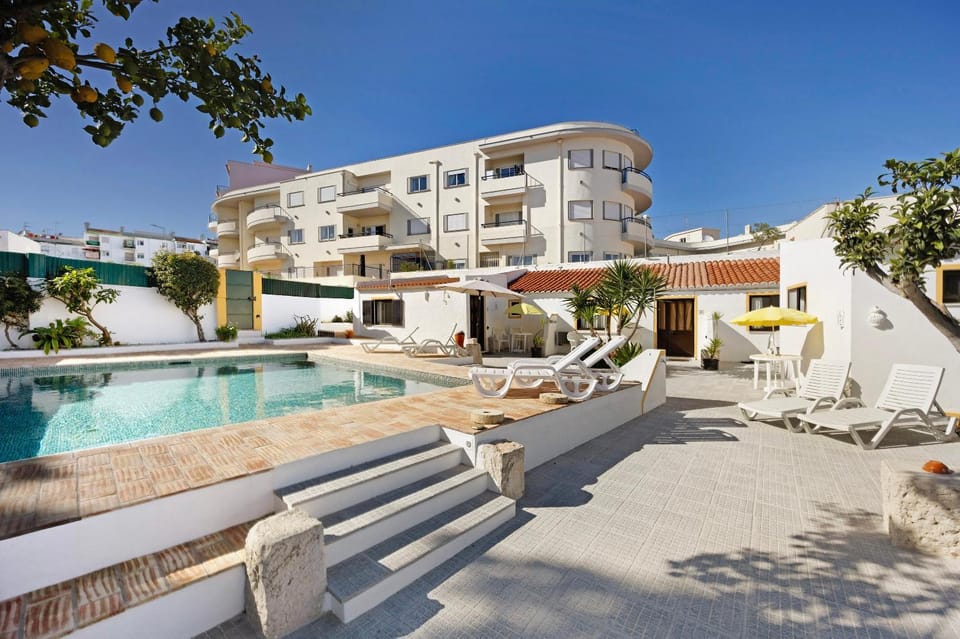 Property building, Living room, Swimming pool