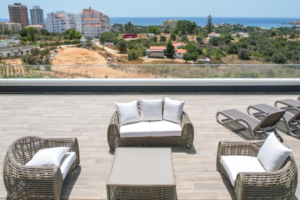 Property building, Patio, Day, Natural landscape, View (from property/room), Balcony/Terrace, Seating area, City view, Sea view