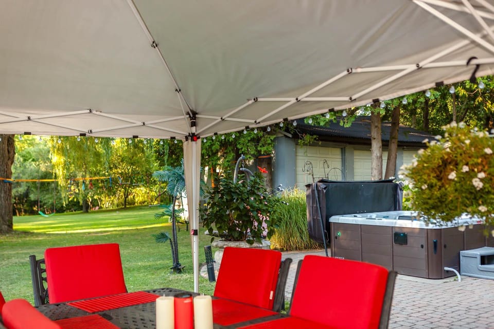 Patio, Day, Natural landscape, Summer, Garden, Hot Tub, Seating area, Garden view, Seasons, Sunset