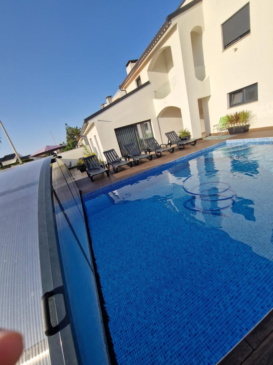 Swimming pool, sunbed