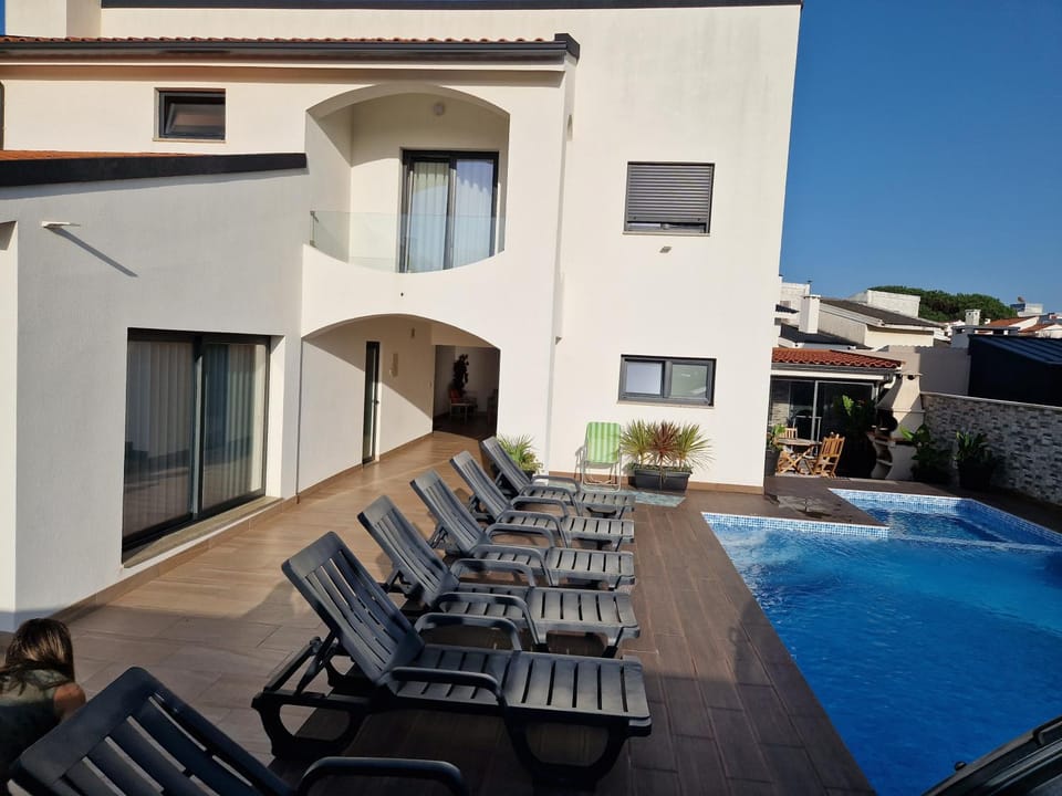 Property building, Swimming pool, sunbed