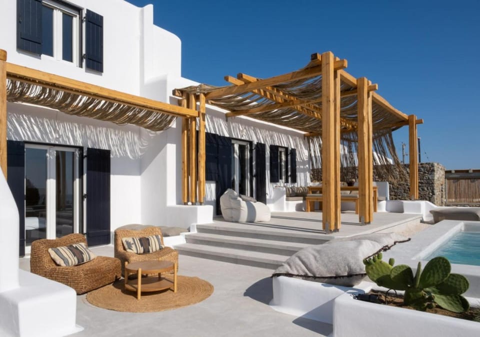 Property building, Day, Living room, Seating area, sunbed