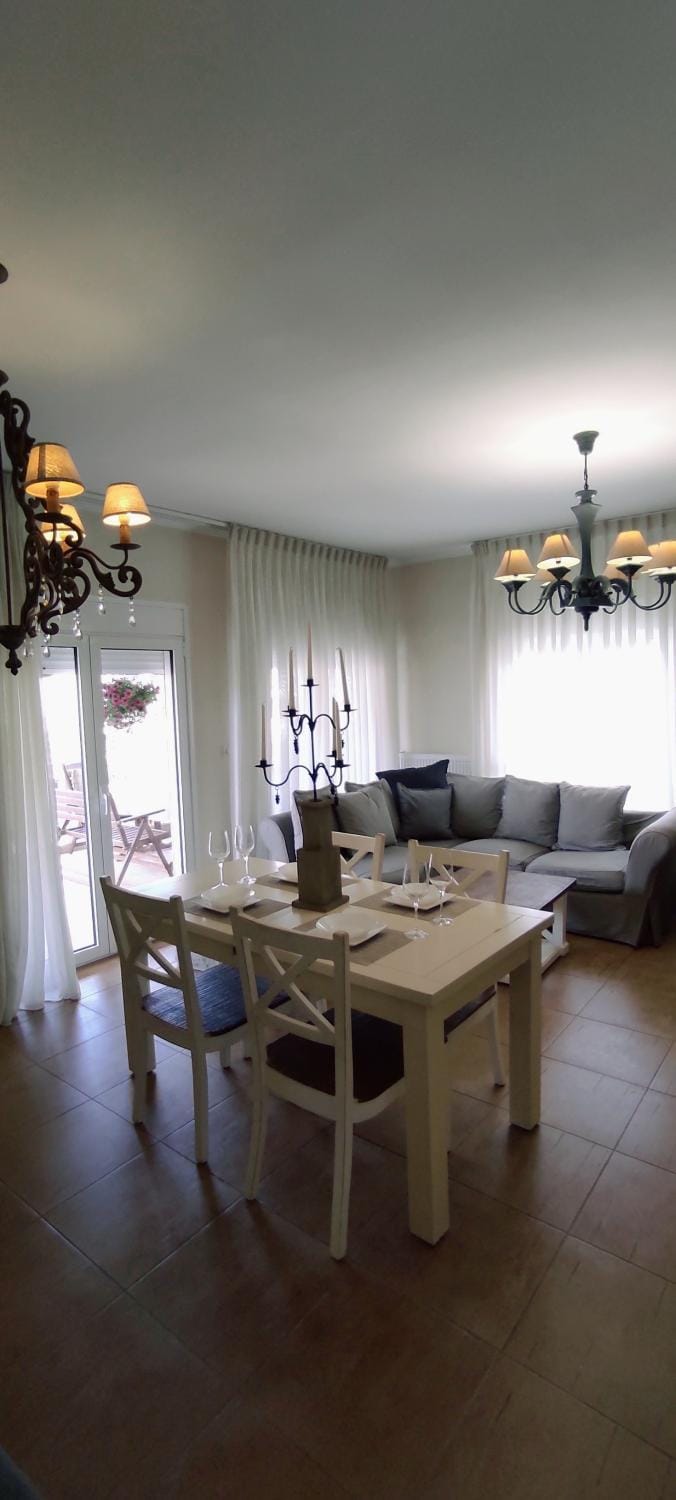 Bed, Living room, Seating area, Dining area
