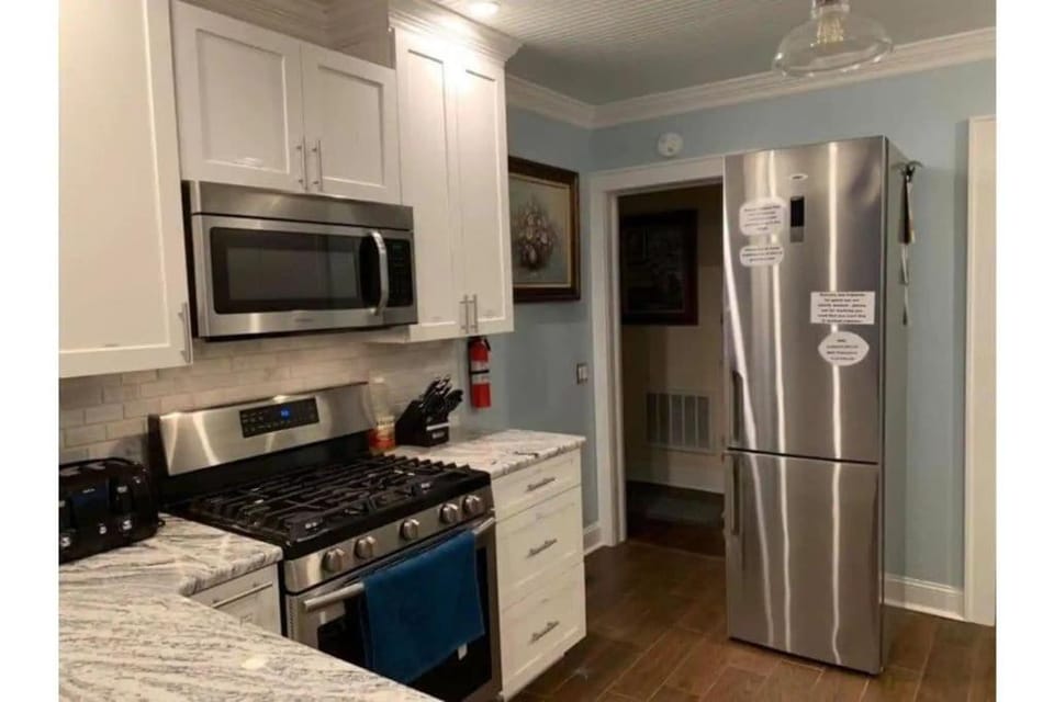 Kitchen or kitchenette, stove, toaster