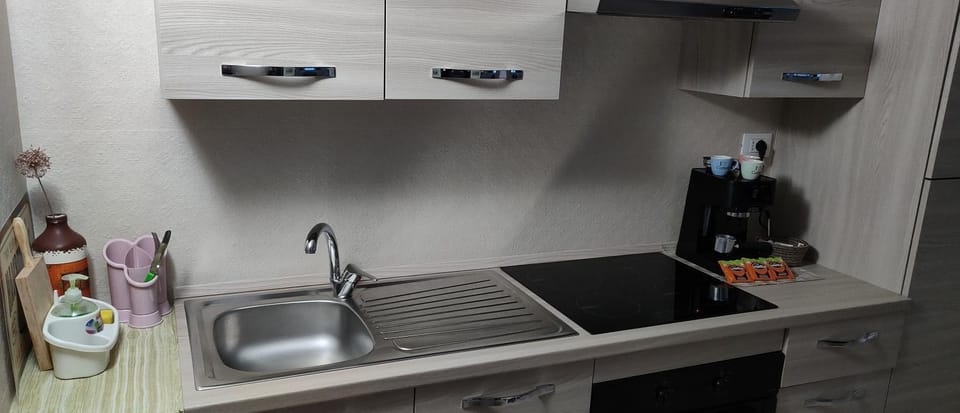 Kitchen or kitchenette, stove