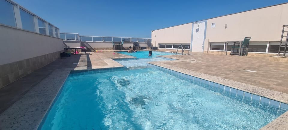 Swimming pool, sunbed