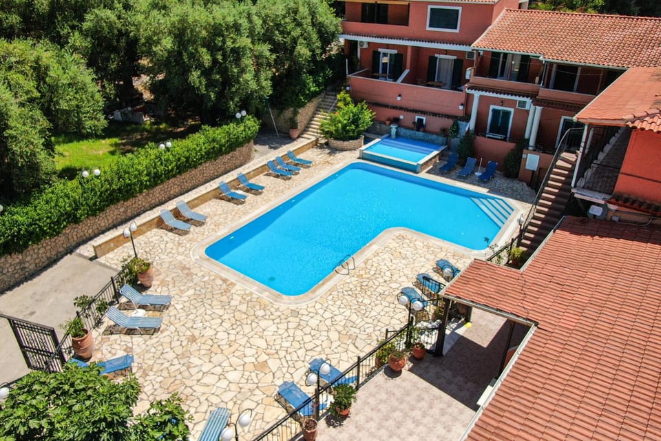 Property building, Living room, Swimming pool