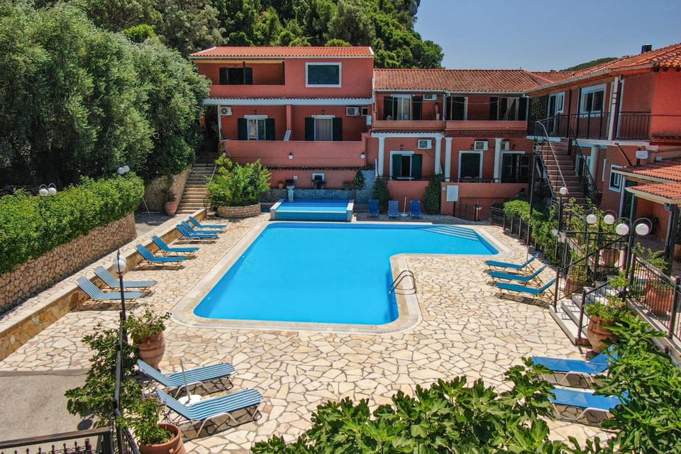 Property building, Living room, Swimming pool