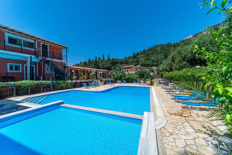 Property building, Living room, Swimming pool