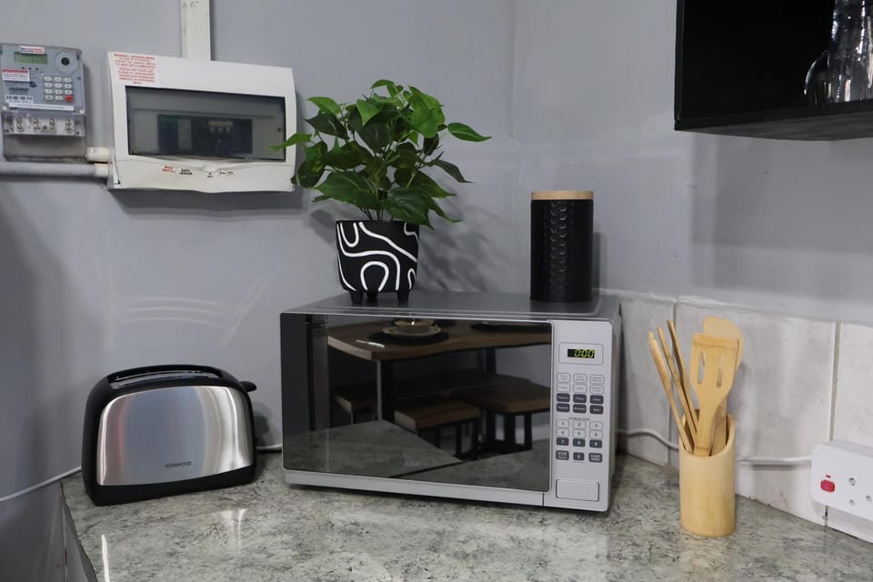 Kitchen or kitchenette, microwave, toaster
