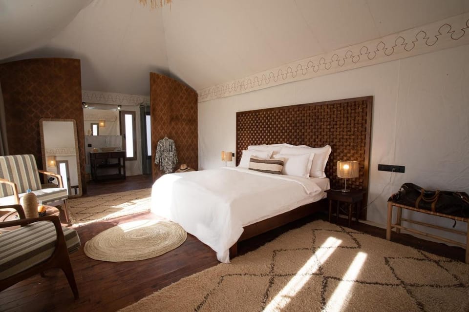 Bed, Living room, Seating area, Bedroom