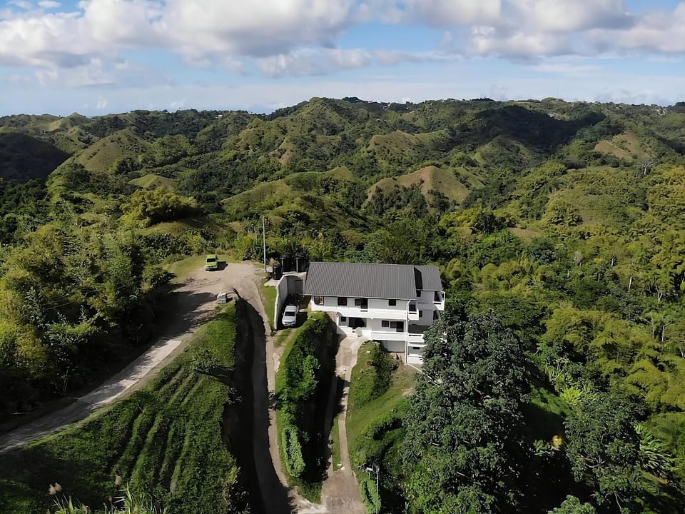 Property building, Patio, Day, Natural landscape, Bird's eye view, Mountain view, Parking