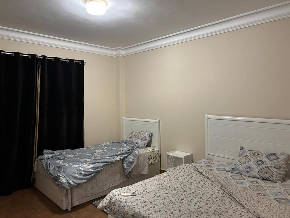 Comfortable apartment with a private garden near AUC شقه فندقيه Apartment in New Cairo City
