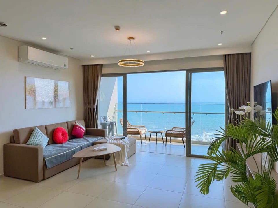 Bed, Natural landscape, Balcony/Terrace, Living room, Beach, Evening entertainment
