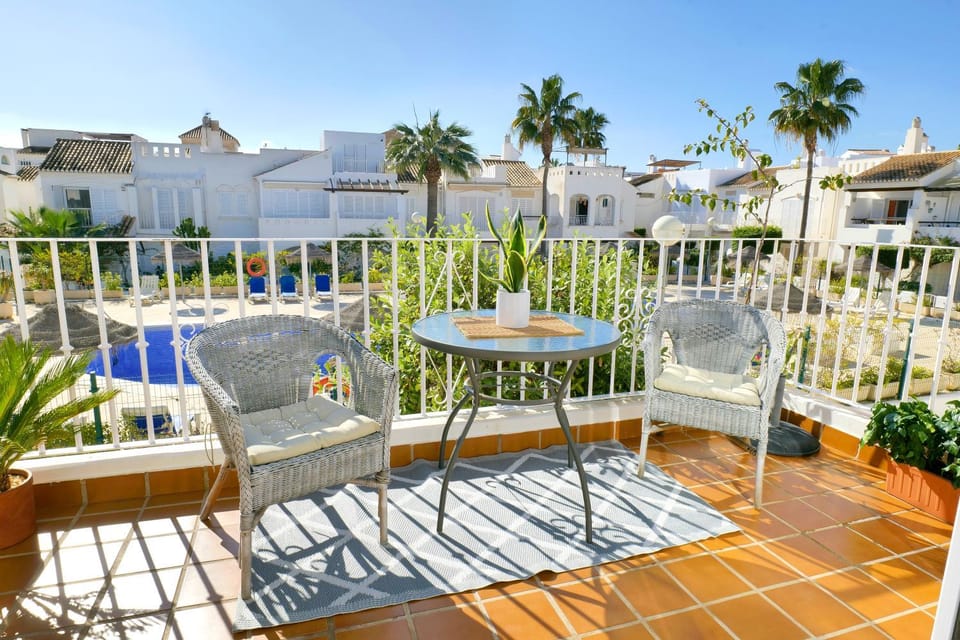 Property building, Day, View (from property/room), Seating area, Pool view