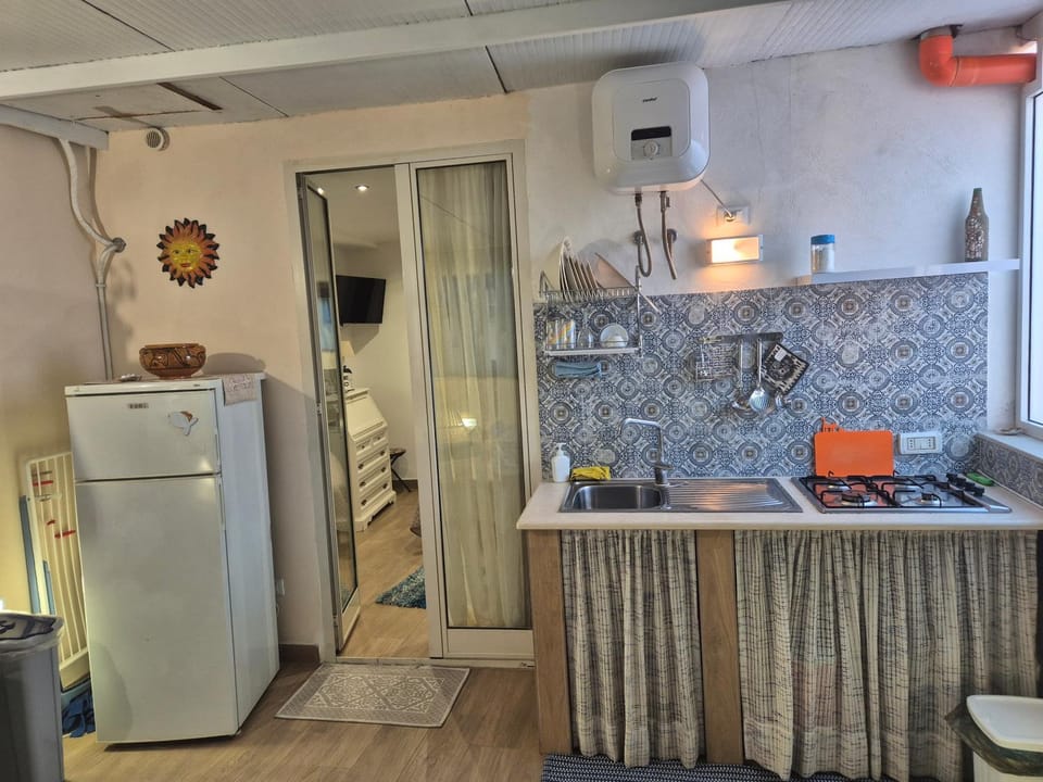 Kitchen or kitchenette, stove