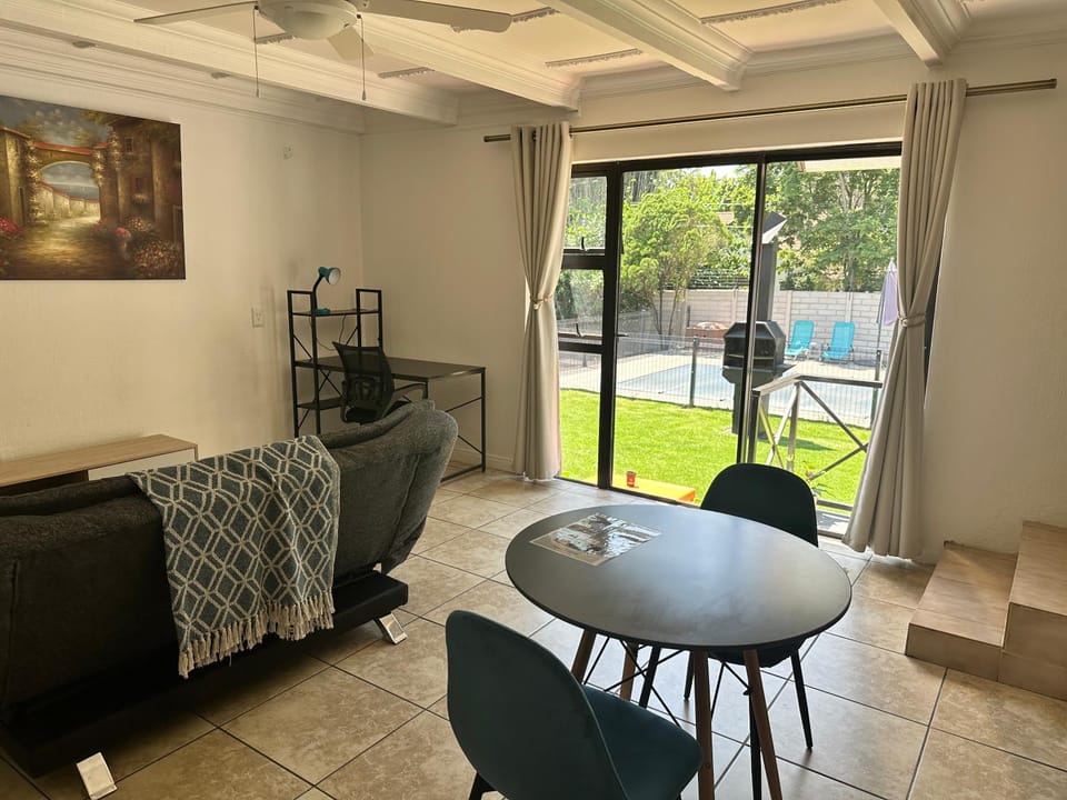 Living room, Dining area, Pool view