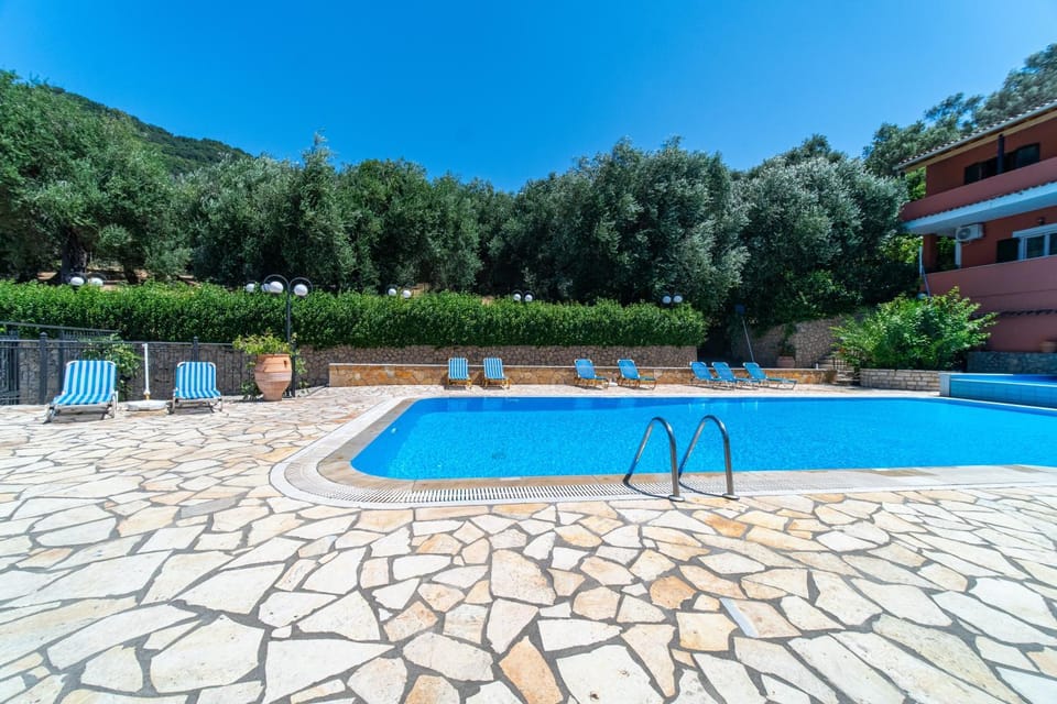 Property building, Living room, Swimming pool