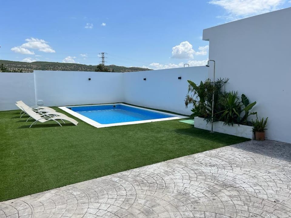 Swimming pool, sunbed