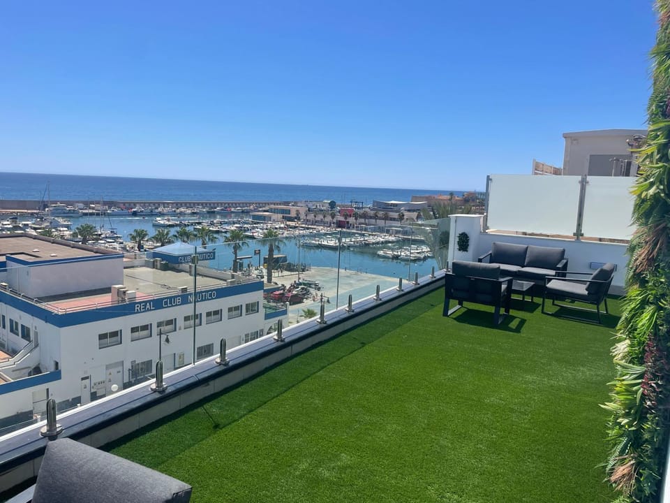 Property building, Day, View (from property/room), Balcony/Terrace, Living room, Seating area, Sea view, sunbed