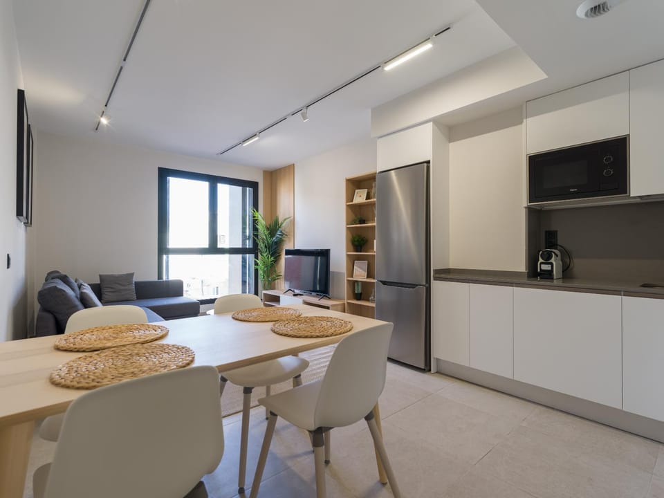 Kitchen or kitchenette, Living room, Seating area, Dining area