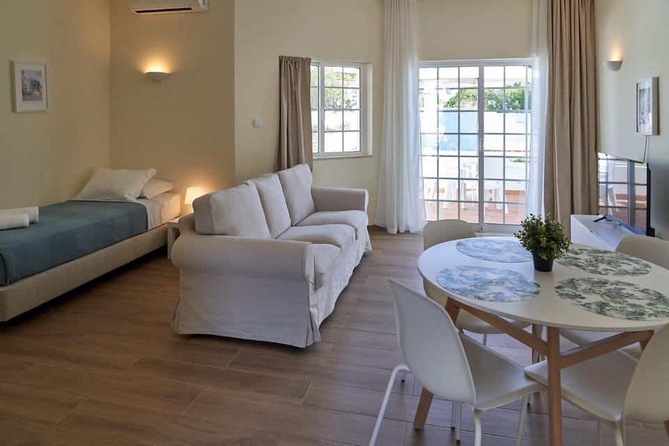 Bed, Living room, Dining area