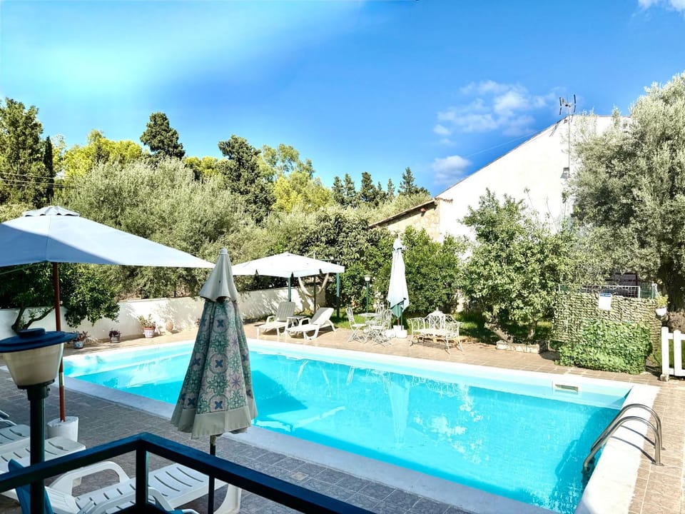 Patio, Nearby landmark, Spring, Day, Natural landscape, Mountain view, Pool view, Swimming pool, sunbed