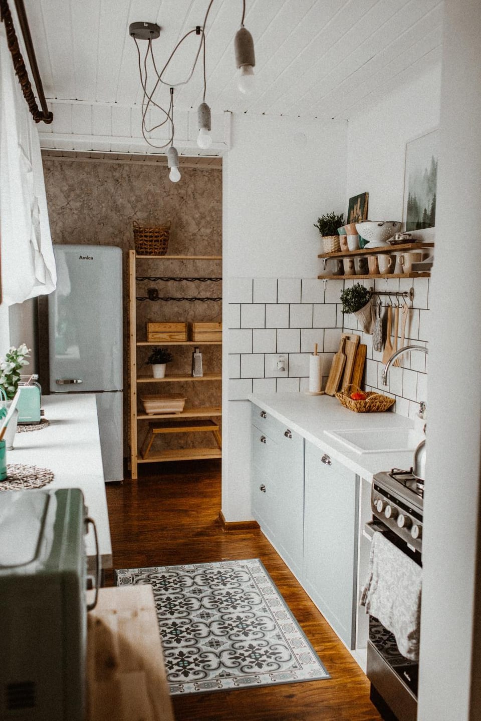 Kitchen or kitchenette, dishwasher, oven, stove