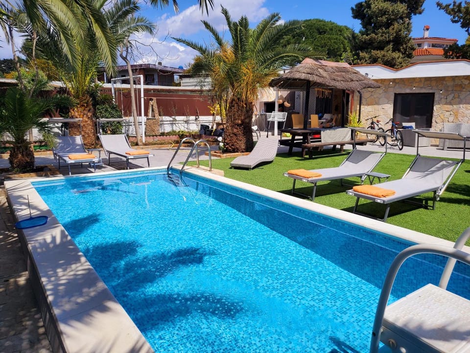 Property building, Living room, Swimming pool