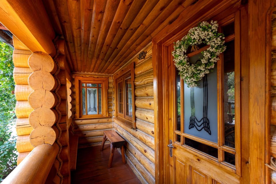 Traditional Log Cabin next to Harry Potter Studios Cabin in Watford