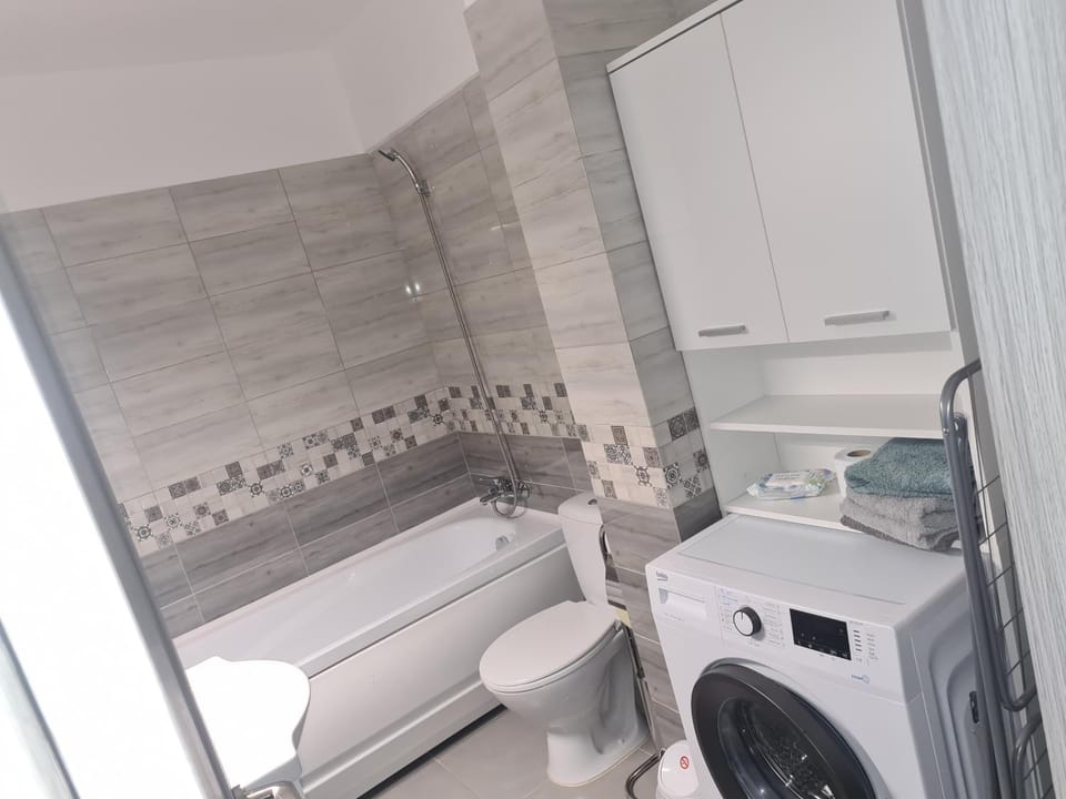 Bathroom, towels, washing machine