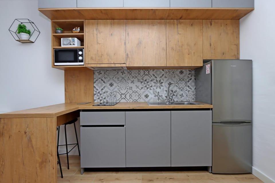 Kitchen or kitchenette, oven, stove