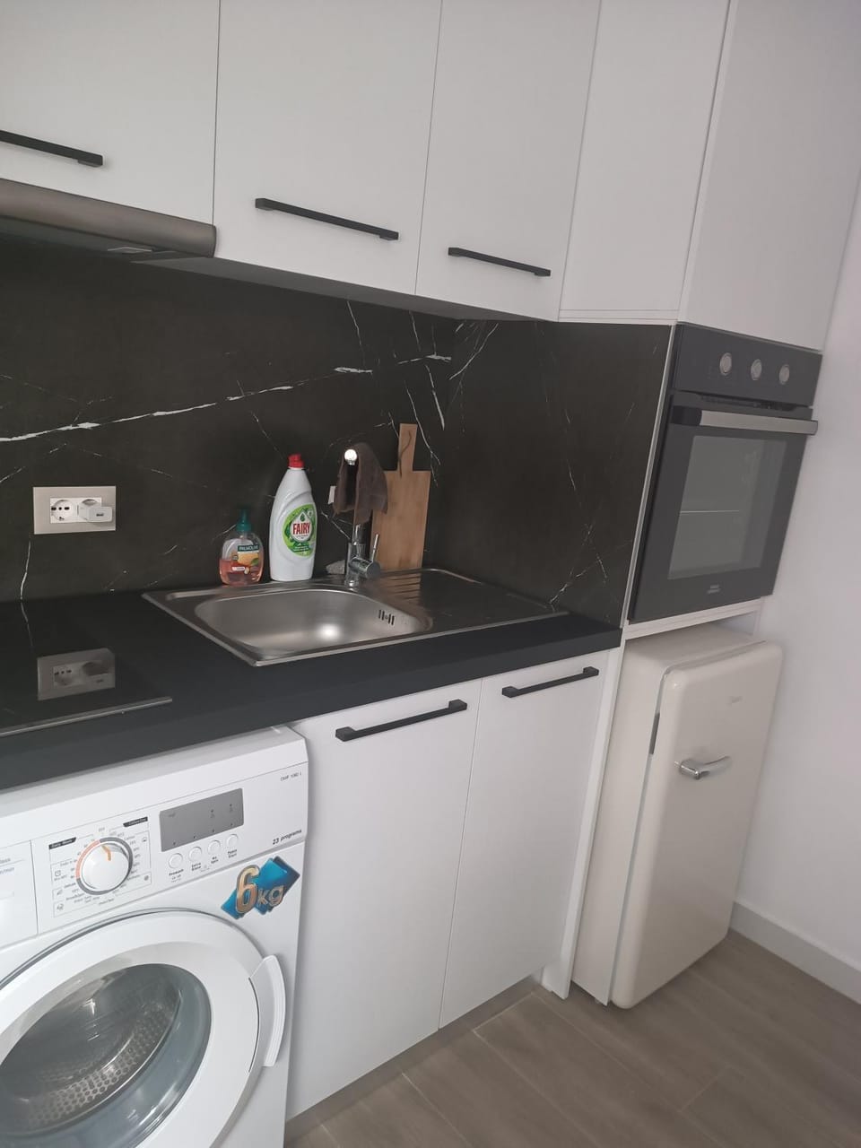 Kitchen or kitchenette, dishwasher, washing machine