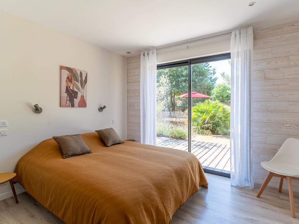 Villa familiale 10 pers. à Biscarrosse avec piscine chauffée, près du lac et des pistes cyclables Villa in Sanguinet