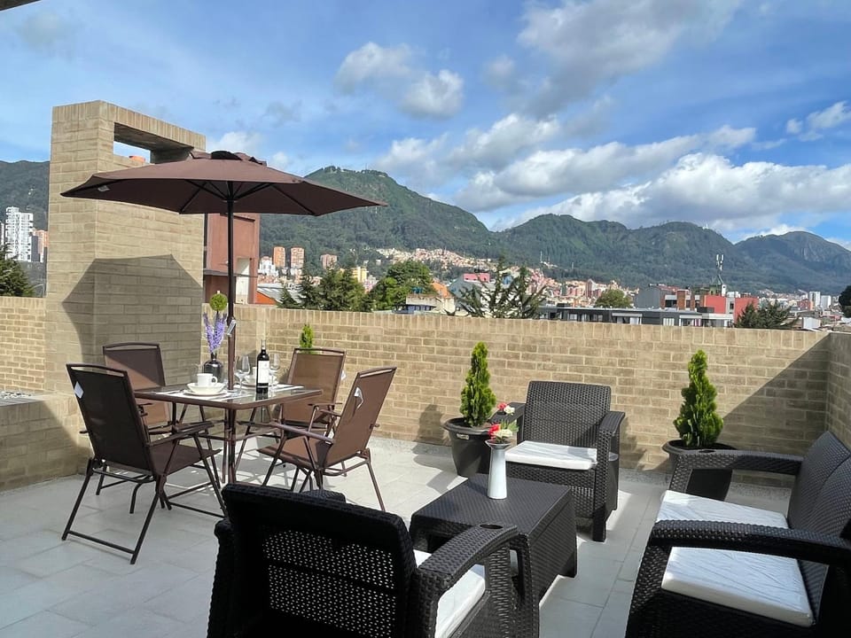 Property building, Patio, Day, Natural landscape, View (from property/room), Balcony/Terrace, Seating area, Dining area, Mountain view