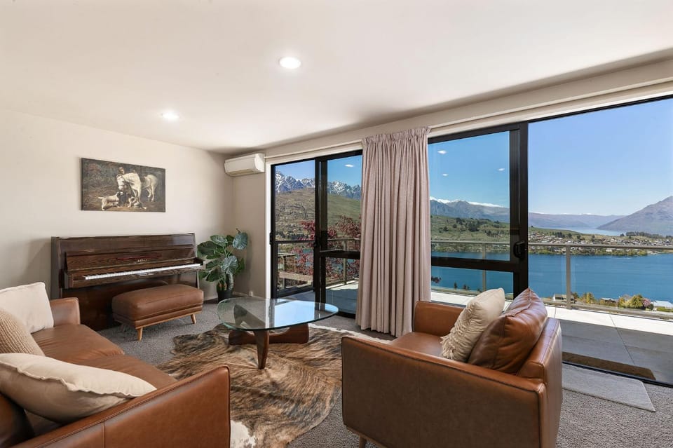 Spring, Day, View (from property/room), View (from property/room), Living room, Seating area, Lake view, Lake view, Mountain view, Mountain view