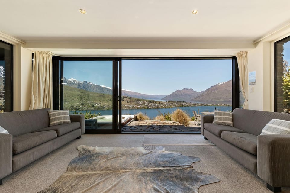 Patio, Spring, View (from property/room), Living room, Seating area, Lake view, Lake view, Mountain view, Mountain view