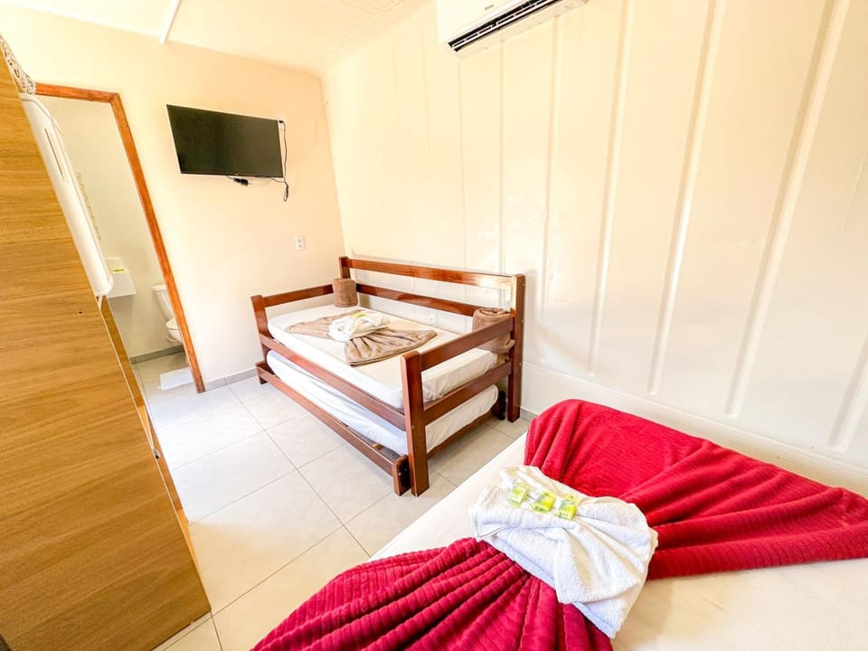 Bed, Bedroom, locker, towels, air conditioner